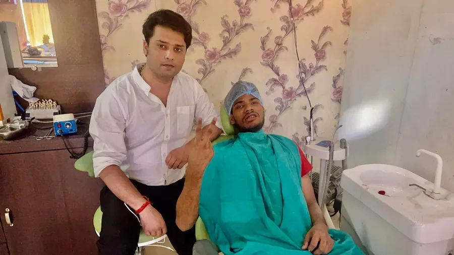 Dr. Rohit Raj with a patient